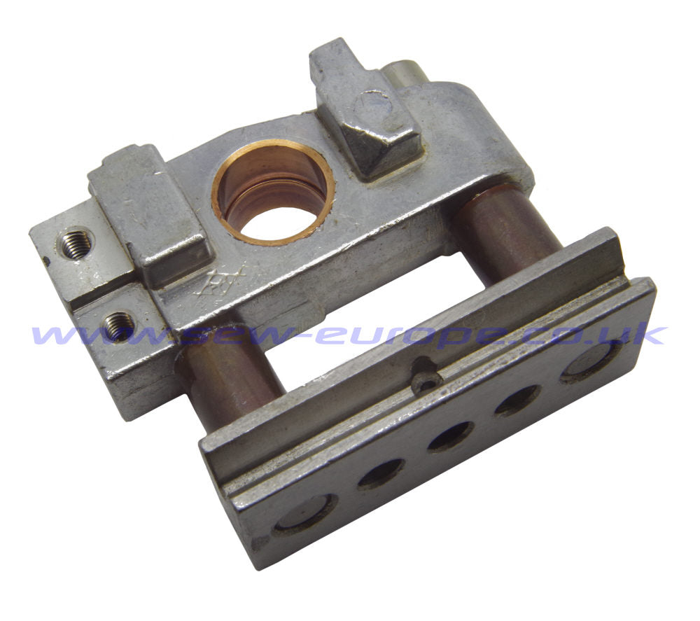 244011A FEED DOG CARRIER